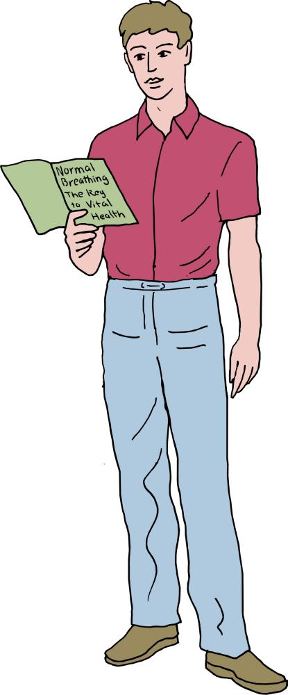 young man standing reading Buteyko book, Normal breathing: the key to vital health
