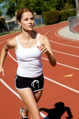 Athletic breathing woman - exercise effects