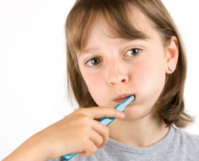 Girl tooth brushing