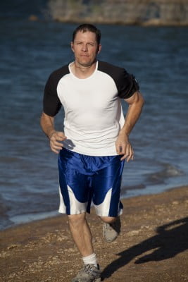 Man runing on a beach