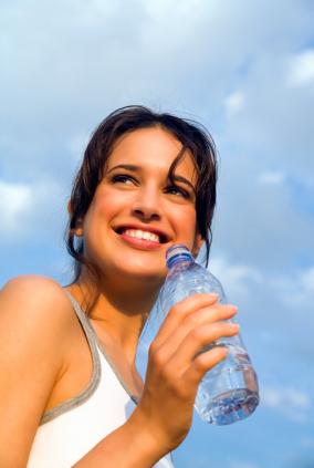 Woman smiling during exercise with good physical health